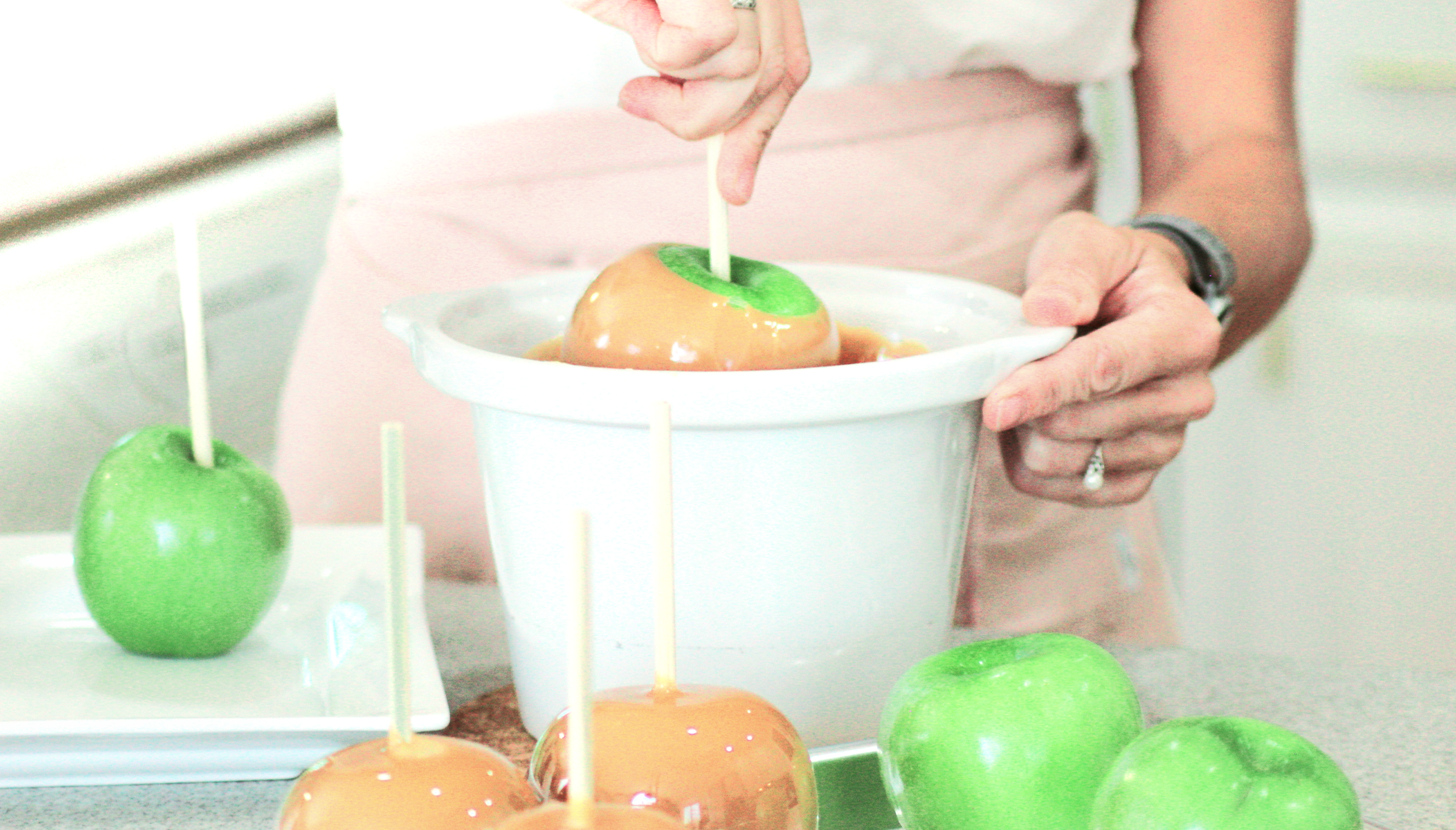 Gourmet caramel apples with toppings
